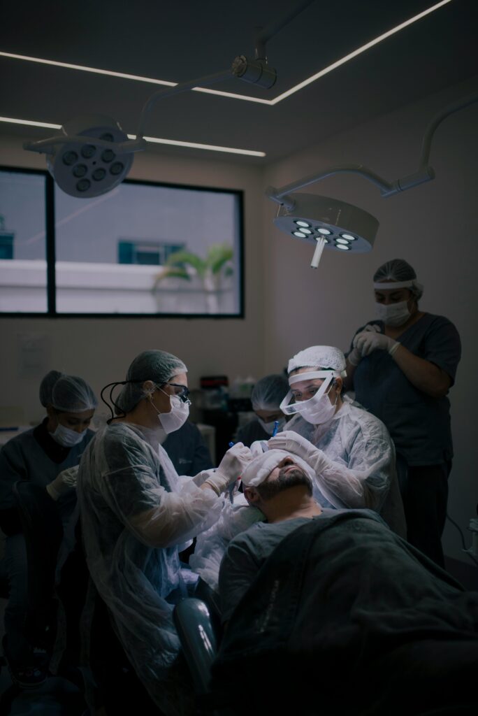 Photo of a Man Getting a Hair Transplant Surgery